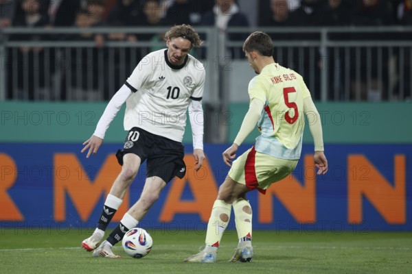 Football, U21, Friendly match, 2024/2025, Germany U21 vs. Spain U21, 25.03.2025, Merck-Stadion am Böllenfalltor, Darmstadt, Germany, Nick WOLTEMADE (Germany U21, 10) in duel with Enrique SALAS Spain U21, Europe