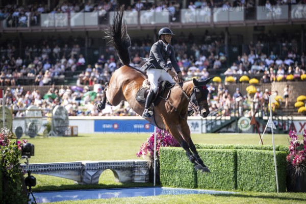 Mariano Martinez Bastida of Spain and riding Jup compete in the first round of the 1.60m CPKC International during the Spruce Meadows Masters, presented by Rolex, in Calgary, Alberta, Canada, North America