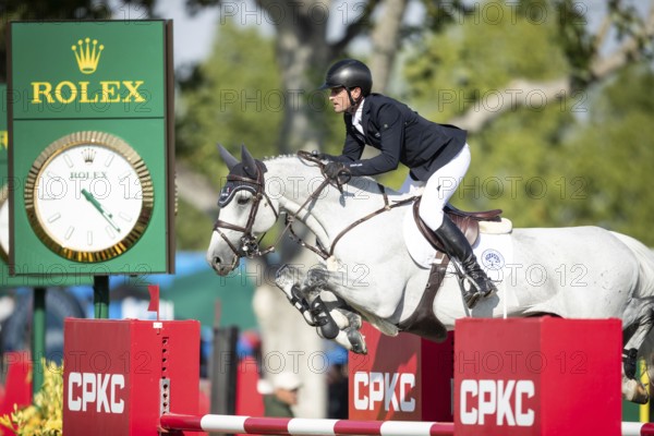 Irish rider Darragh Kenny riding VDL Cartello competes in the second round and jumpoff of the CPKC International GP at Spruce Meadows Masters, in Calgary, Alberta, Canada, North America