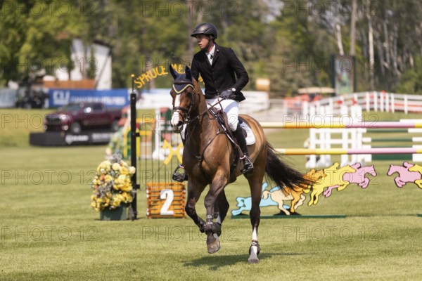 Vaclav Stanek from Czechoslovakia, and riding Quintin, compete in the 1.60m Grand Prix during The Continental international competition at Spruce Meadows, in Calgary, Canada, North America