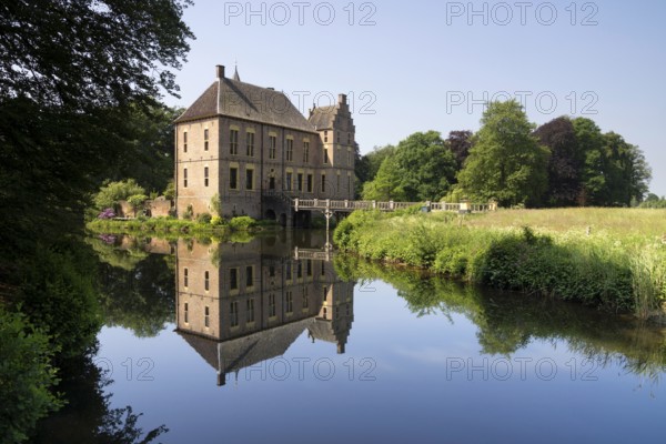 The beautiful castle Vorden in the village of the same name in the Achterhoek, reflecting in its moat