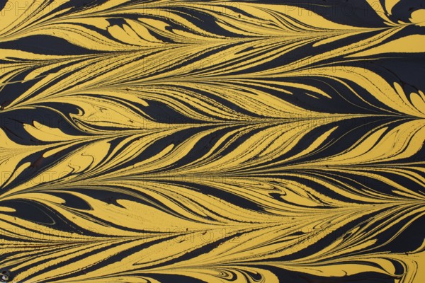 Beautiful abstract art of Ebru marbling painting techniques on water with paints