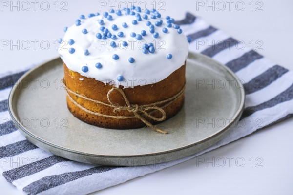 Happy Day Bright Easter. Orthodox Easter holiday. Traditional food. Creative stylish trend Homemade easter cake and eggs. Selective focus. Kulich Festive easter background Minimalism
