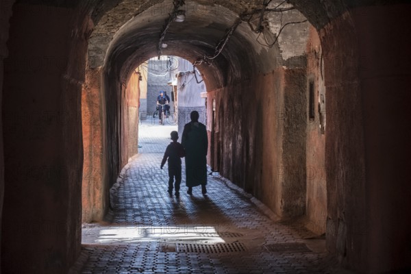 Lights and shadows in the alley, marrakesh, morocco