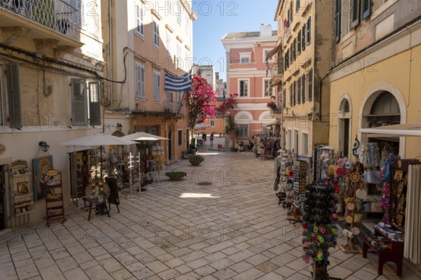 A street scene in Corfu Town on the Greek island of Corfu in the Ionian Sea, known for its pastel-colored Venetian architecture