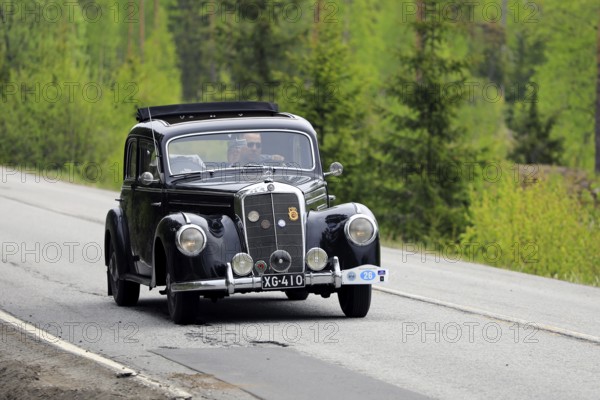 Classic Mercedes-Benz 220 year 1952 on Ascension Day vintage car rally by AHS ry, road 104, Fiskars, Finland. May 26, 2022