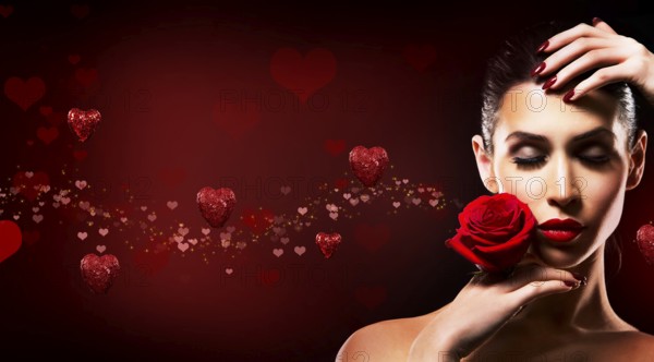 Beautiful woman with dramatic makeup and red lips. Red flower rose. Hearts in the background, Toronto, Canada, North America