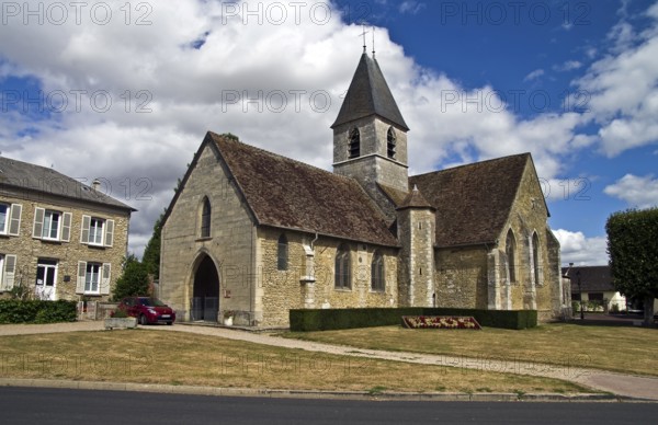 Church in the central square a small town in Normandy, France, Europe