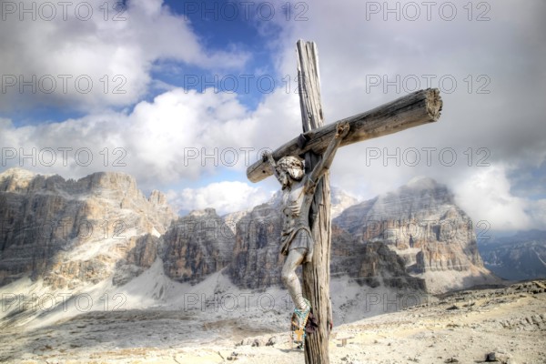 Dolomites, detail of the crucifix of the Tofane mountain group, a UNESCO World Heritage Site in Italy