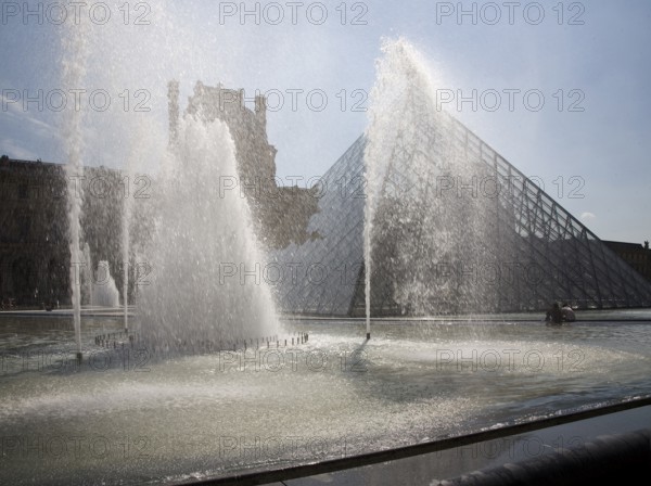 Courtyard of the Louvre with pyramid by Ieoh Ming Pei