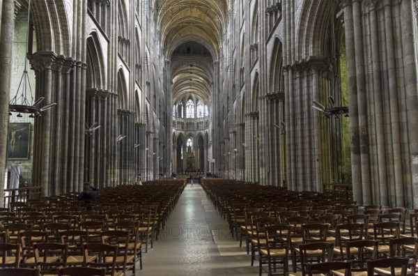 Rouen, France, August 30, 2018: Interior of a catholic temple. Central nave of the Notre-Dame de Rouen Cathedral, Rouen, France, Europe