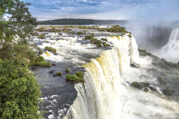 Tourists at Iguassu Falls at Iguassu National Park, World Natural Heritage Site by UNESCO