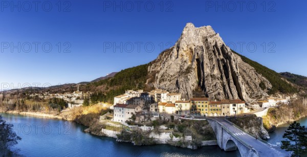 Sisteron, France, 6 March, 2023: panorama view of the village of Sisteron and the Rocher de la Baume cliff, Europe