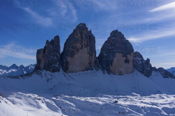 Tre Cime Di Lavaredo. The Three Peaks on Sunny Day in Winter. Aerial View. Sexten Dolomites, South Tyrol. Italy. View from the North