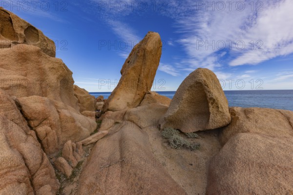 Coastal landscape with bizarre red rocks and sea view, Spiaggia di Cala E'Luas, Ogliastra, Sardinia, Italy, Europe