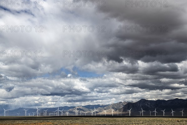 Wind turbines during a storm on Highway 50, Loneliest Road in America, Ely, Nevada, USA, North America