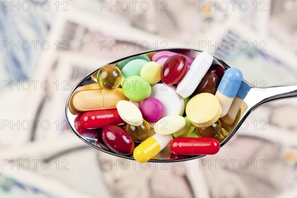 Tablets and Japanese yen currency, symbol of healthcare costs