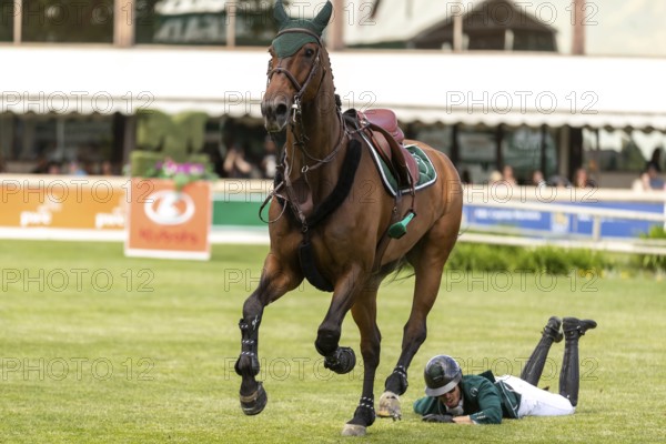 Abdulrahman Alrajhi of Saudi Arabia loses his mount, Ventago, during the 1.60m RBC Grand Prix of Canada presented by Rolex at Spruce Meadows. Niether rider or horse were injured on June 14, 2025 in Calgary, Alberta, Canada, North America