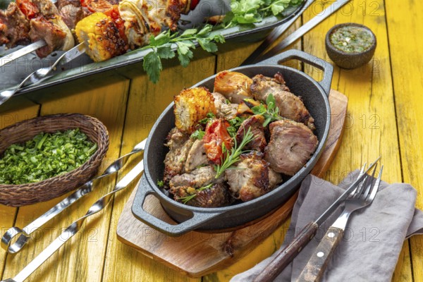 Food, Food, Bbq grilled meat, pork, chicken and vegetable on cast iron pan. Grilled skewers on yellow wooden background. Top view