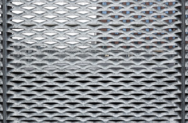 Leuven, Flemish Brabant, Belgium, 12 18 2021: Abstract close up of a metal grid with patterns, Europe