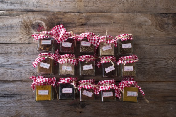 Of small glass jars for storage of various types of aromas for international cuisine