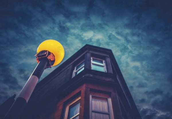 A Belisha Beacon Outside A Flat At Night In A Residential Area Of A British City