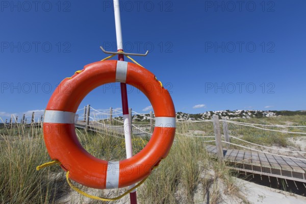 Alaior Cala Son Bou in Menorca round orange boy at Balearic islands