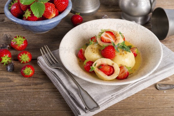 Dumplings with strawberries