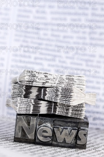 The word News was written in lead letters. Symbol photo for newsletters, newspapers and Information Austria