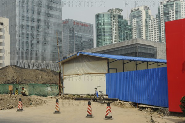16.08.2012, Beijing, China, Asia, A construction site in the business centre of the Chinese capital with new buildings in the background, Asia