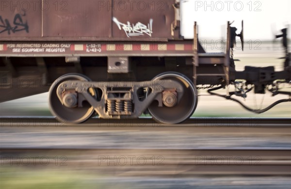 Blurred Train wheels in motion panned Canada