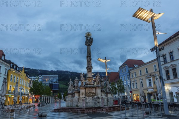 Evening atmosphere, rain clouds over the main square, plague column column, Leoben, Styria, Austria, Europe