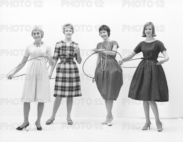 In the 1950s. Women Hula hooping. A craze that culminated during 1958 with some 20 million hula hoop rings sold in less than four months in the USA. Sweden 1958. ref BV18-6