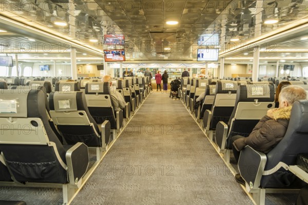 Algeciras, Spain, December 15, 2023: People enjoying their ride on the ferry to Ceuta, Europe