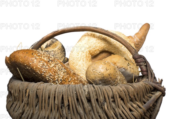 Bread in basket. White isolated
