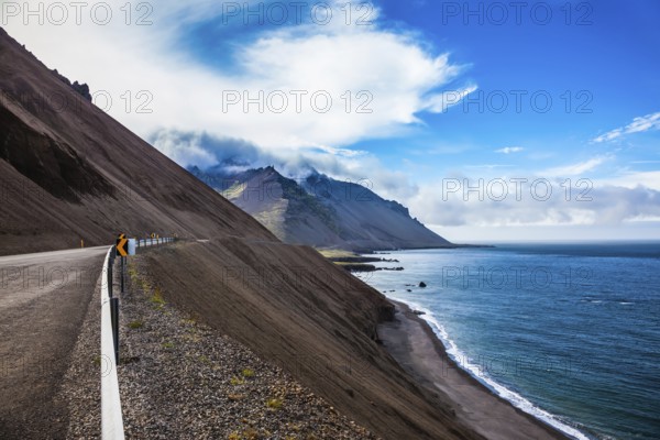 The main highway in Iceland on the Atlantic coast. The concept of extreme northern tourism. Summer tour in the Nordic countries