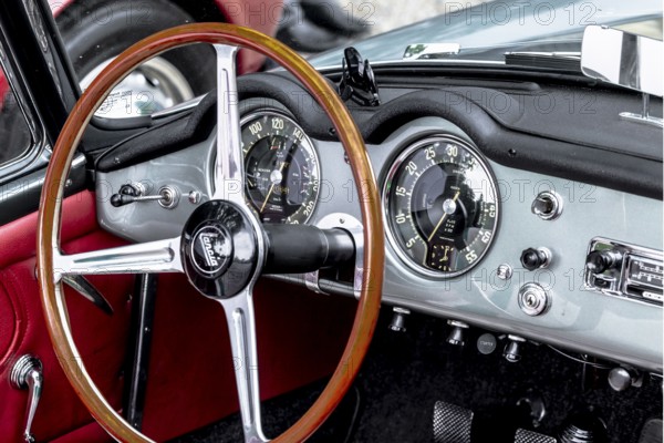 Vintage car Lancia Aurelia Convertible B24-S, year of construction 1958, 2451 ccm, 118 hp, 150 km/h, close-up of the dashboard with steering wheel