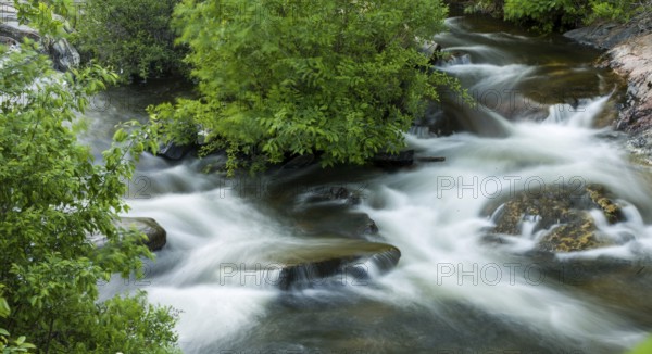 A slow shutter speed creates the feel of rushing water over rocks