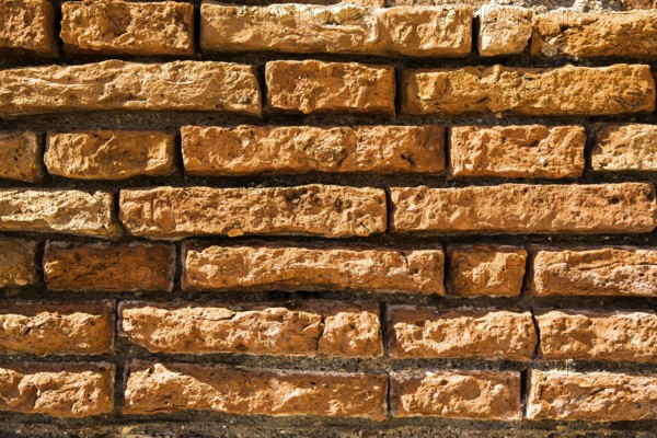 Brick wall as stony textured surface