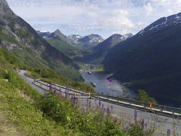 From Wikipedia: The Geirangerfjord is one of Norway's most famous fjords and has been a UNESCO World Heritage Site since 14 July 2005. It is approx. 15 kilometres long and between 0.6 and 1.3 kilometres wide. Geiranger is a continuation of the Sunnylvsfjord, which in turn is a branch of the Storfjord. At the end of the Geirangerfjord, approx. 100 km from the coastline, lies the village of Geiranger