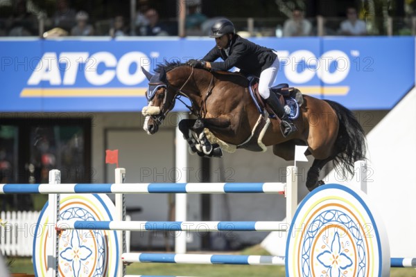 Sameh El Dahabn of Great Britain and riding WKD Toronto compete in the first round of the 1.60m CPKC International during the Spruce Meadows Masters, presented by Rolex, in Calgary, Alberta, Canada, North America