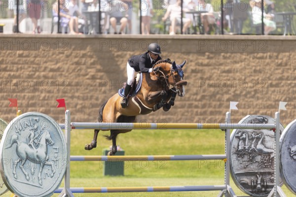 Sameh el Dahan of Great Britain, riding WKD Toronto, compete in the 1.60m Grand Prix during The Continental international competition at Spruce Meadows, in Calgary, Canada, North America