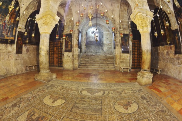 Jerusalem - September 3: Hall of the Holy Sepulchre in September 3, 2012 in Jerusalem. The hall in the Temple of the Holy Sepulchre. Hall is made entirely of marble. From the ceiling by chains hanging lamps and candlesticks. Photo taken by lens Fisheye