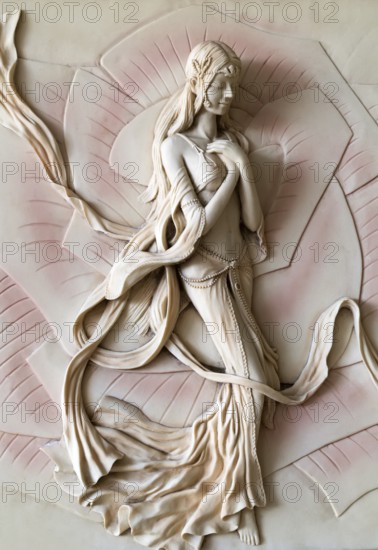 Stone bas-relief in the form of a girl elf