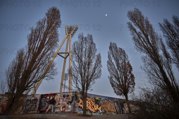 Germany, Berlin, 08.03.2025, Graffiti wall, Mauerpark, floodlight mast of the Cantian Stadium, Europe
