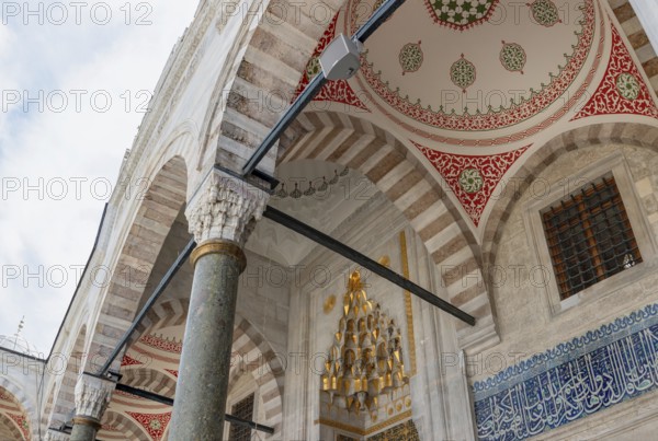 A picture of the colorful and gorgeous gateway to the New Mosque, in Istanbul