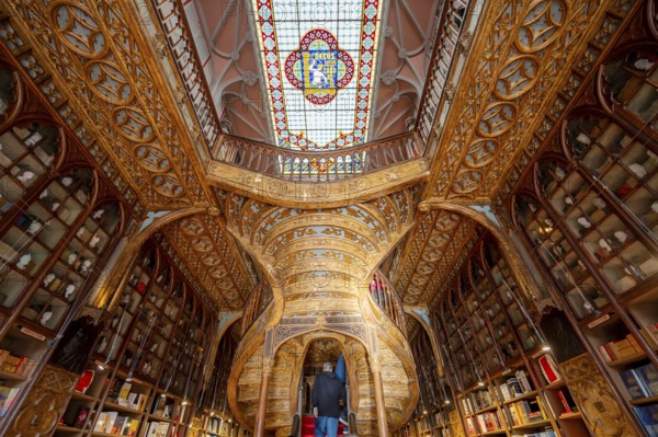 Porto, Portugal, February 7, 2023 : Interior of Lello Bookstore one of the most beautiful bookstores in the world. graphy, Europe