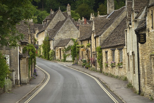 Cottages and main street in Castle Combe, Cotswolds, UK