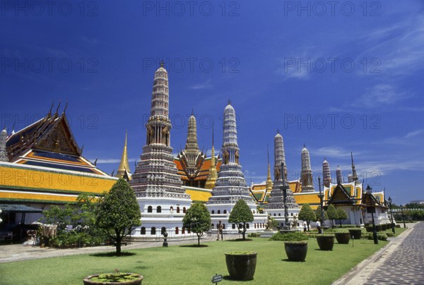 Wat Phra Kaew (Temple of the Emerald Buddha), full official name Wat Phra Si Rattana Satsadaram is regarded as the most sacred Buddhist temple in Thailand. It is located within the precincts of the Grand Palace.<br/><br/> The Grand Palace served as the official residence of the Kings of Thailand from the 18th century onwards. Construction of the Palace began in 1782, during the reign of King Rama I, when he moved the capital across the river from Thonburi to Bangkok