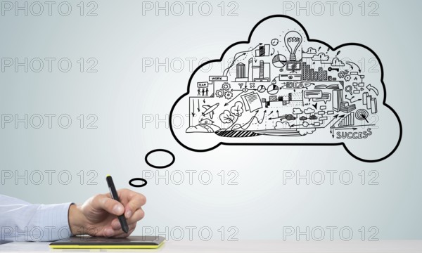 Hand of designer man working with tablet and business sketches at background